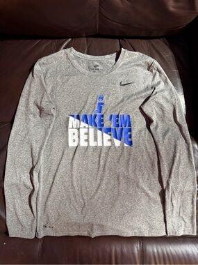 Nike Grey Long Sleeve Dri-FIT 'Make 'Em Believe' Shirt with Blue & White Graphic